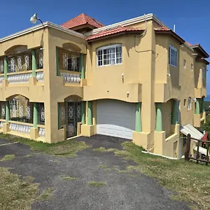 https://poinciana-house.comcaribbean.com
